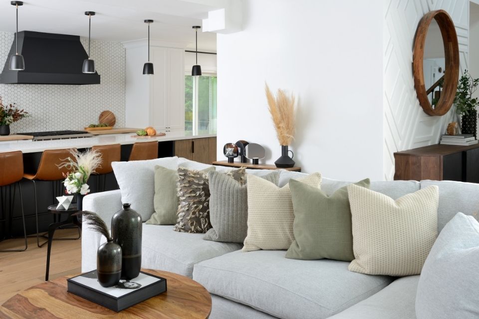 cozy sectional sofa with pillows Design by MICHELLE BERWICK  Photography by LARRY ARNAL